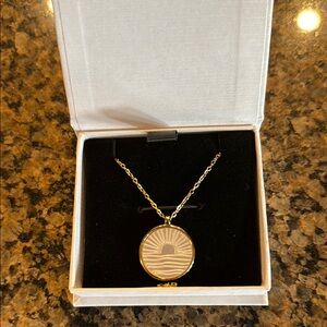 Elegant Gold Pendant Necklace this is Mint and Lily brand